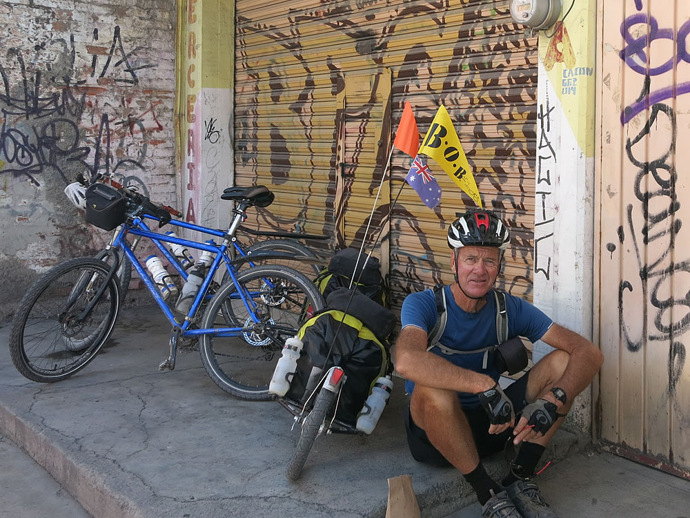 Cycling in to Mexico City - sometimes all you can do is sit in the gutter and comfort yourself with a bag of churros (fried dough pastry sticks)
